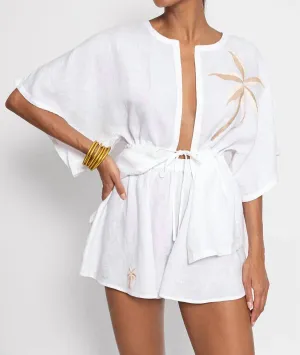 Adela Coverup In White