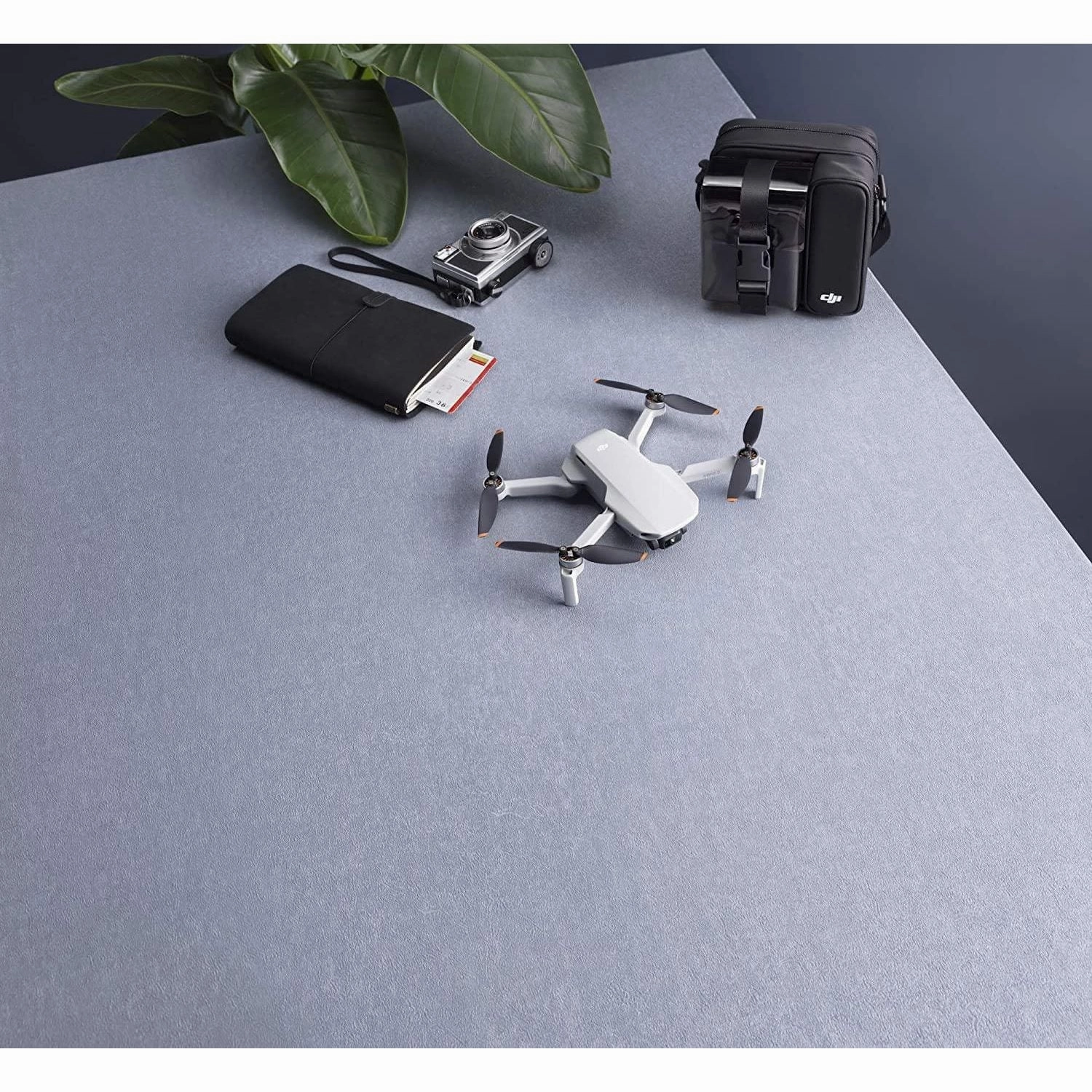 DJI Mini 2 Fly More Combo - Ultralight and Foldable Drone Quadcopter, 3-Axis Gimbal with 4K Camera, 12MP Photo, 31 Minutes Flight Time, OcuSync 2.0 HD Video Transmission, QuickShots DJI Fly App, Grey