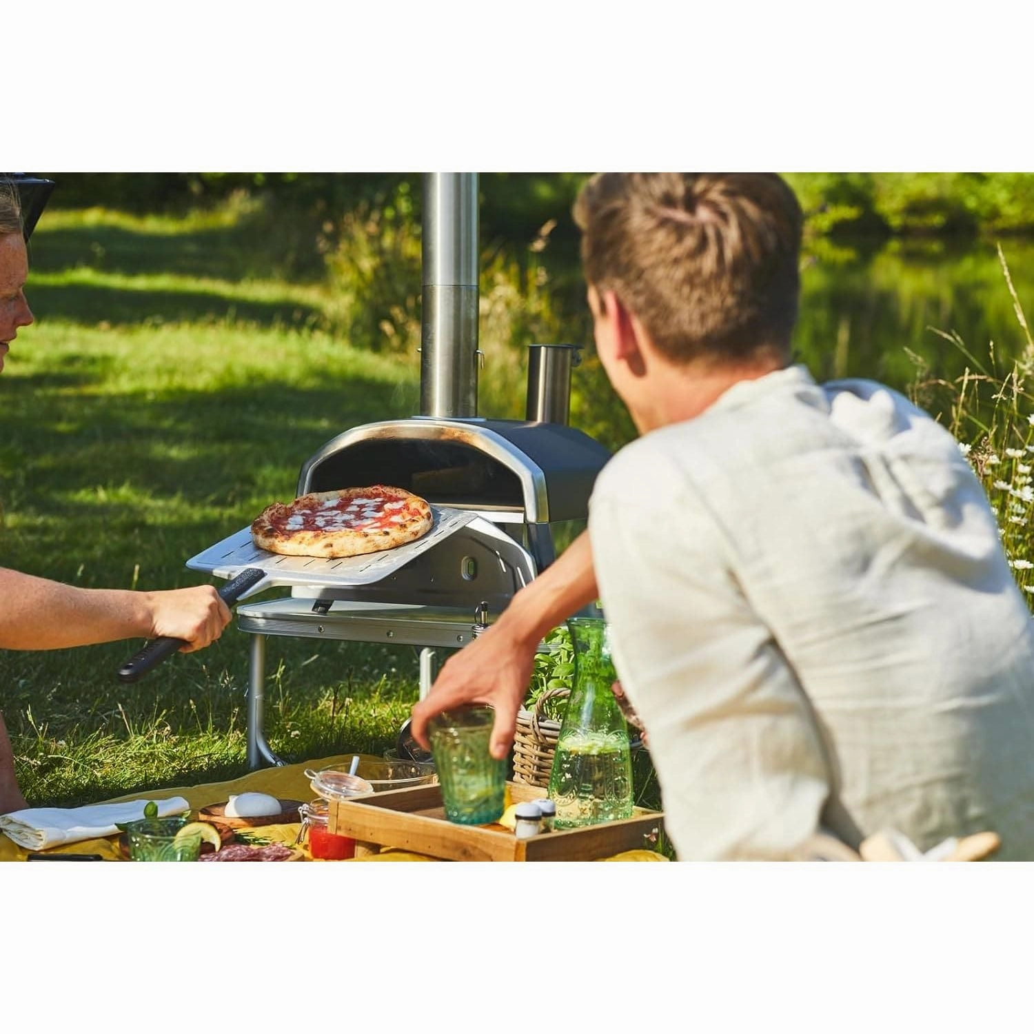 Ooni Fyra 12 Wood Fired Outdoor Pizza Oven  Portable Hard Wood Pellet Pizza Oven  Ideal for Any Outdoor Kitchen - Outdoor Cooking Pizza Maker - Backyard Pizza Ovens - Pizza Oven Countertop